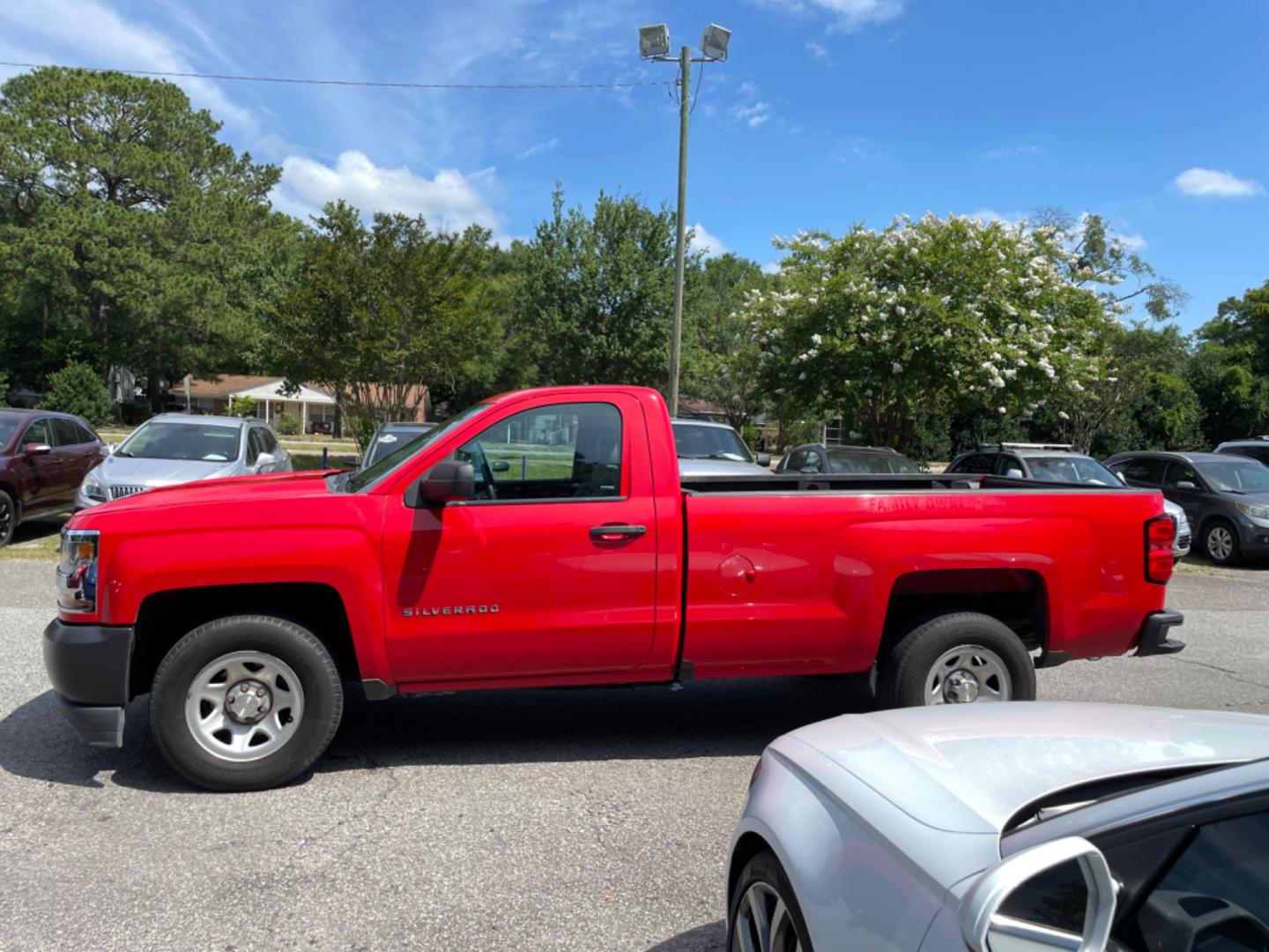 2016 RED CHEVROLET SILVERADO 1500 WORK TRUCK (1GCNCNEH4GZ) with an 4.3L engine, Automatic transmission, located at 5103 Dorchester Rd., Charleston, SC, 29418-5607, (843) 767-1122, 36.245171, -115.228050 - Local Trade-in with Easy Clean Vinyl Interior, Cold A/C, AM/FM Stereo, Power Locks, Bed Liner. Certified One Owner!! Located at New Life Auto Sales! 2023 WINNER for Post & Courier's Charleston's Choice Pre-owned Car Dealer AND 2018-2024 Top 5 Finalist for Charleston City Paper's BEST PLACE TO BUY - Photo#4